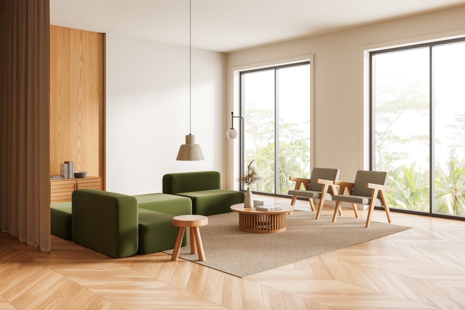 living room with green couches, off-white walls, round brown table and two chairs