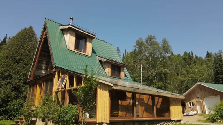 exterior of a diy cabin in spring