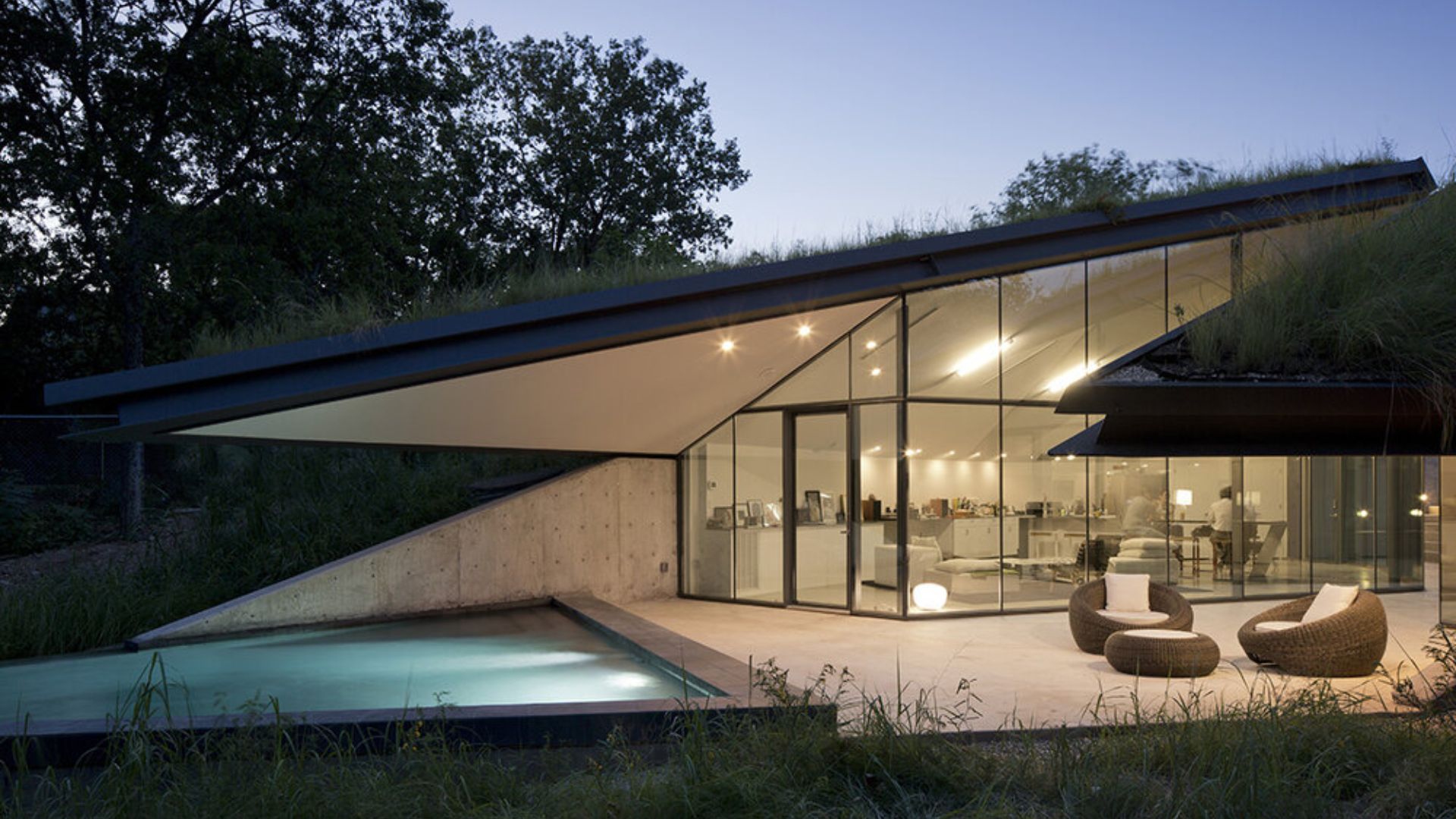 inside the edgečand house with a pool