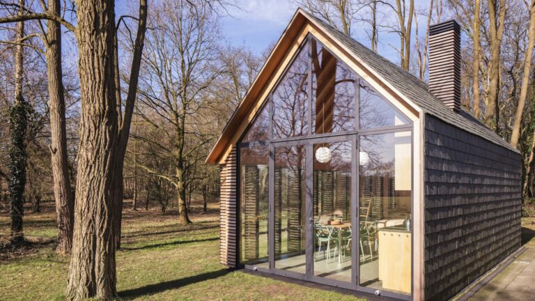 exterior of a cozy cabin with half opened wall