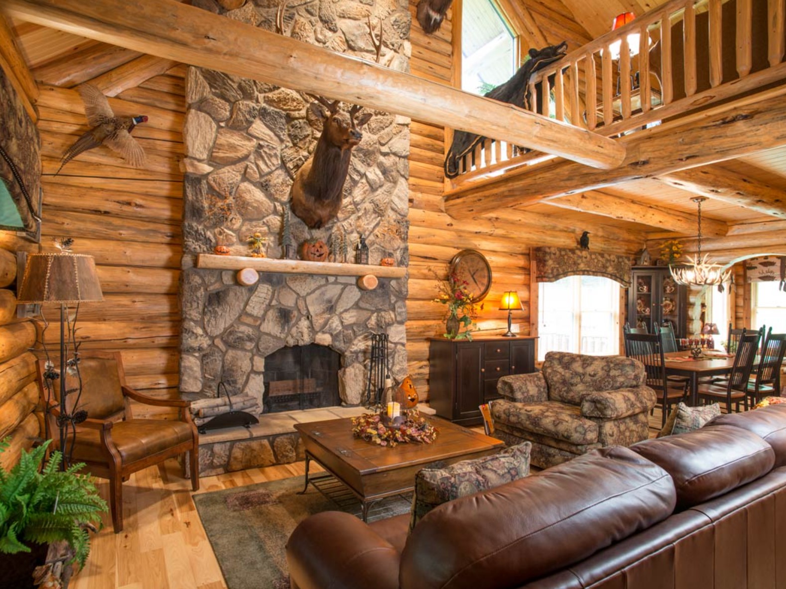 Living room with a stone fireplace