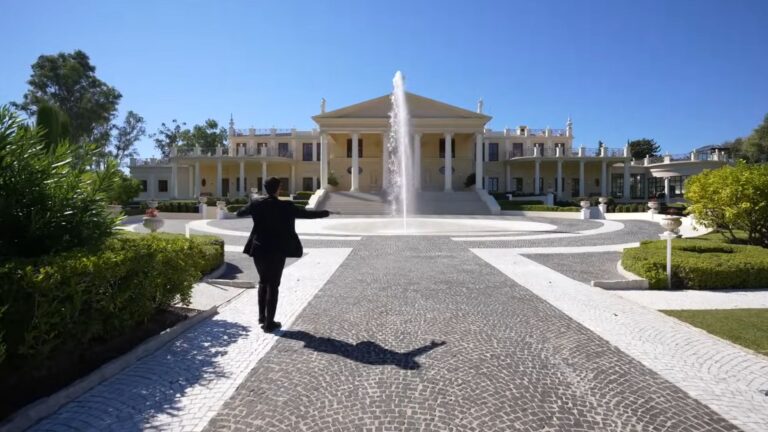 exterior of a big modern house with a lot of land