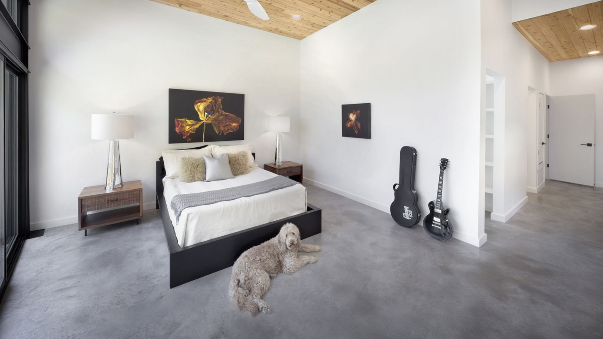 bedroom with a guitar