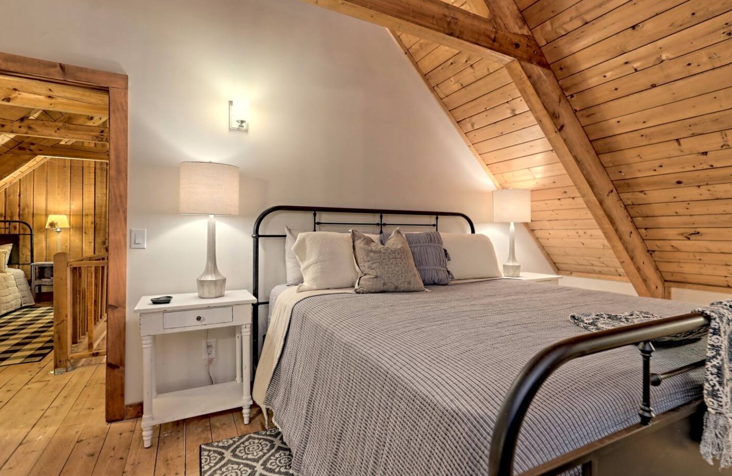 Second bedroom with a rustic-styled bed