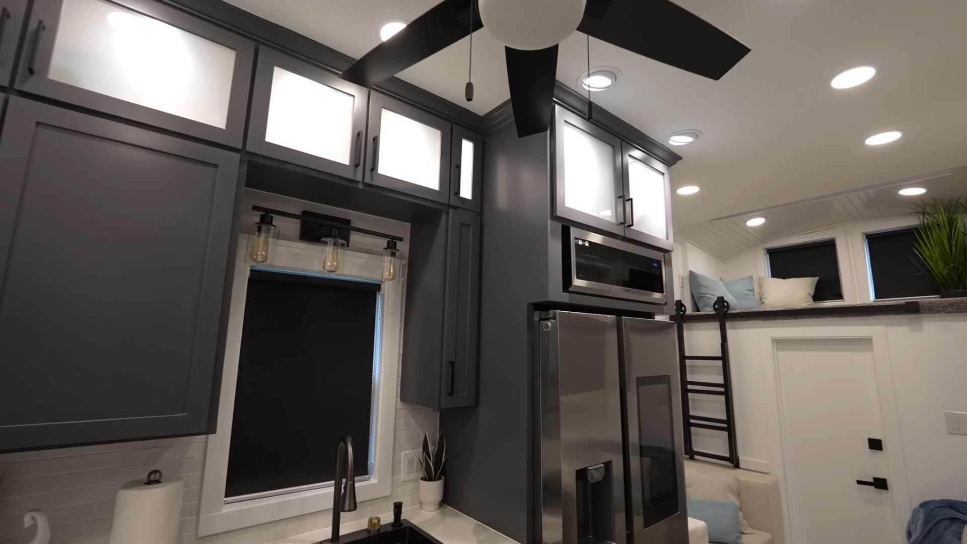 pretty kitchen with black cabinets