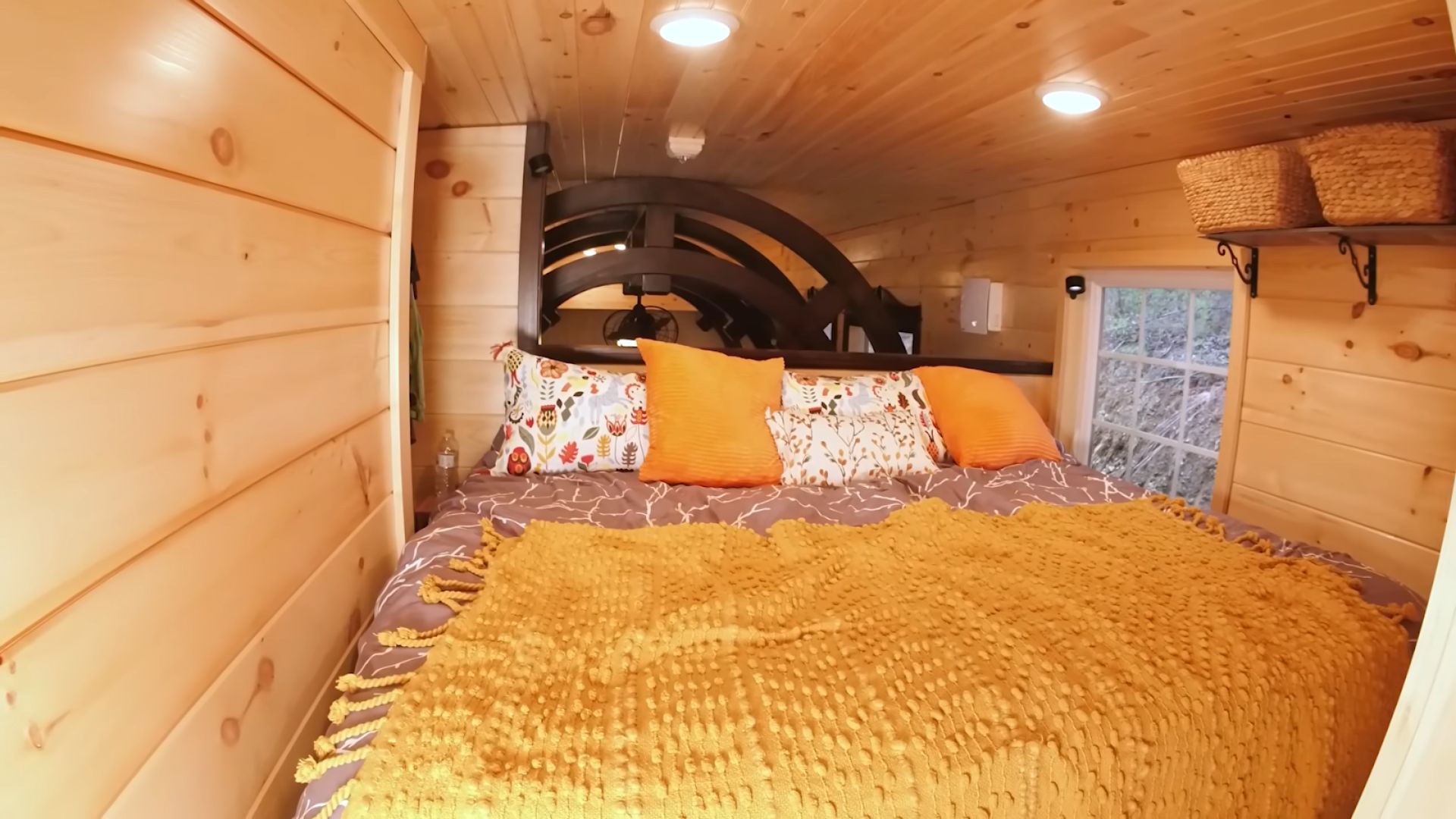 yellow bedroom loft with a king size bed