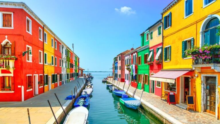 colorful homes around the water in burano