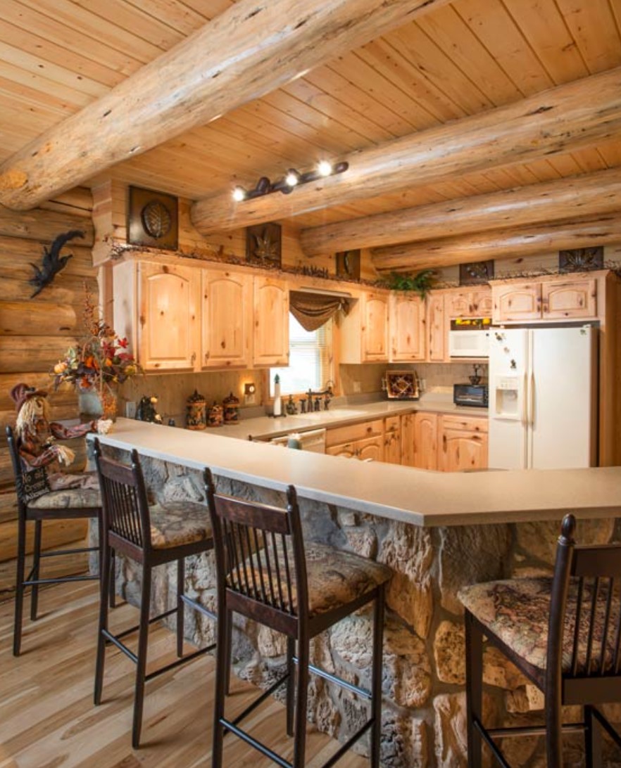 Wooden kitchen with a double fridge