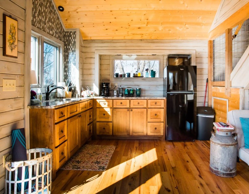 kitchen with wooden cabinets and windows