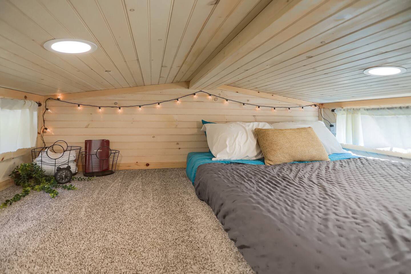 loft bedroom with fairy lights