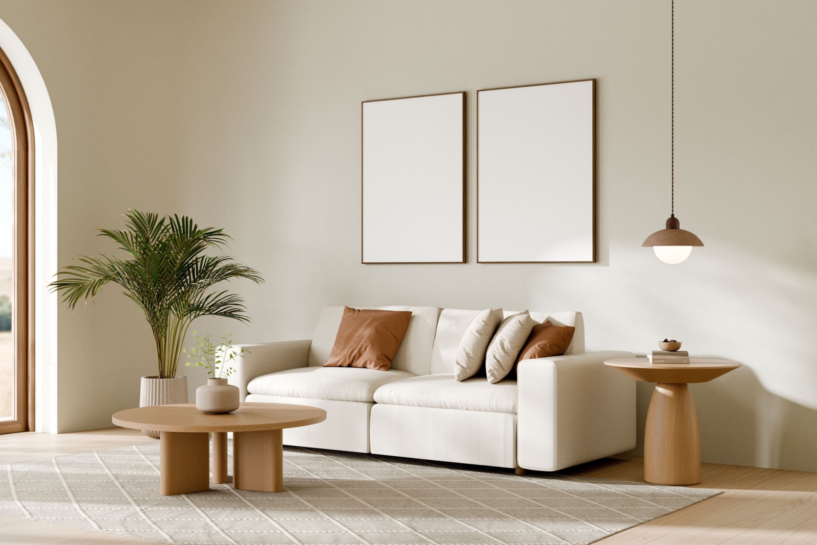 living room with a neutral color palette, white couch, brown mini table and a plant and a low hanging lamp