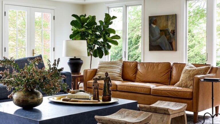 living room with a brown leather couch