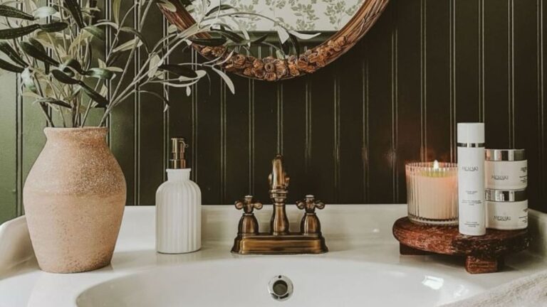 white sink with candles and flowers