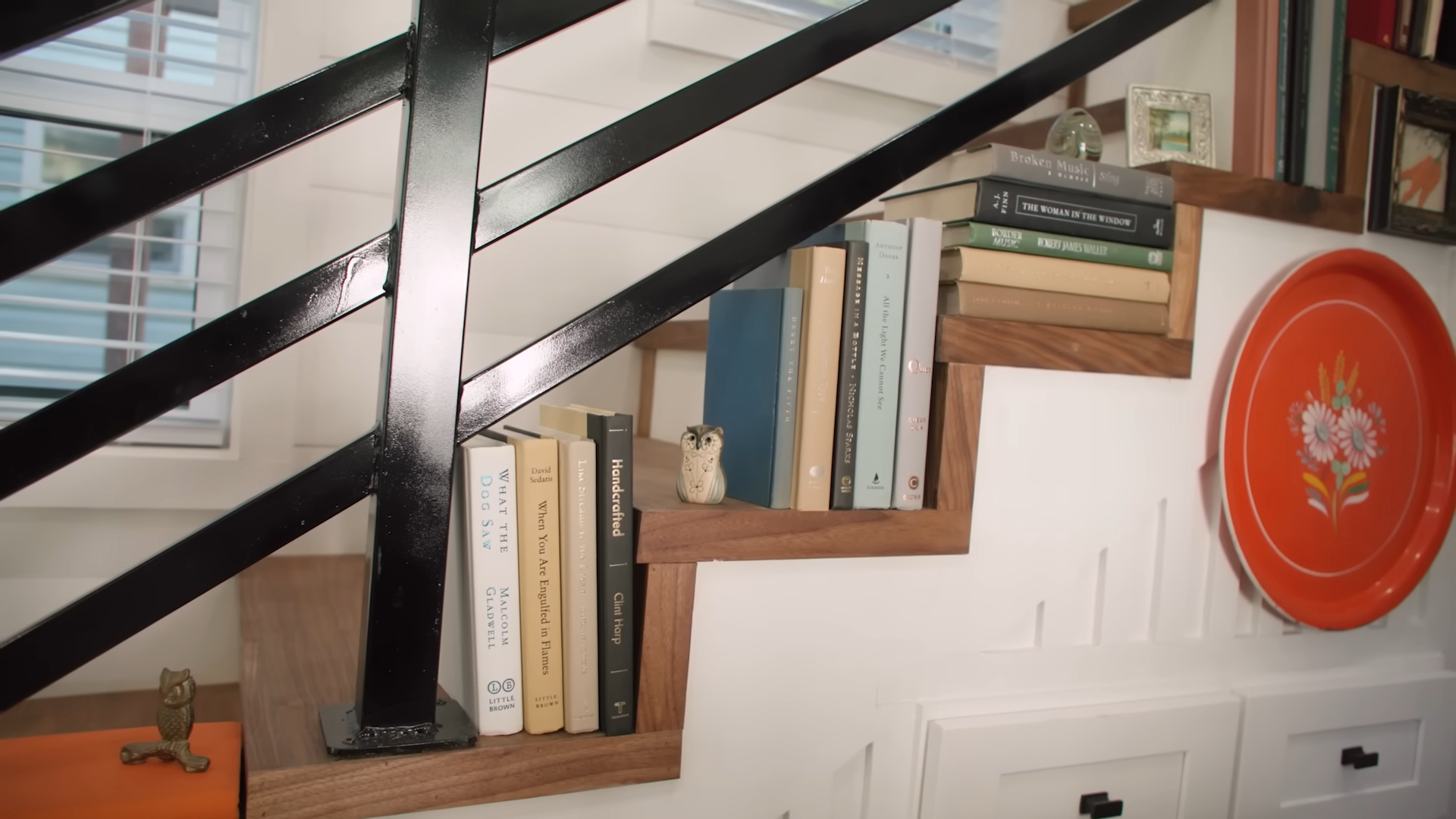 bookshelf under the stairs