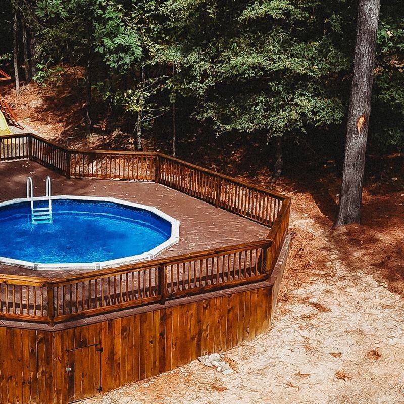 Rustic Cabin Pool with Wooden Deck