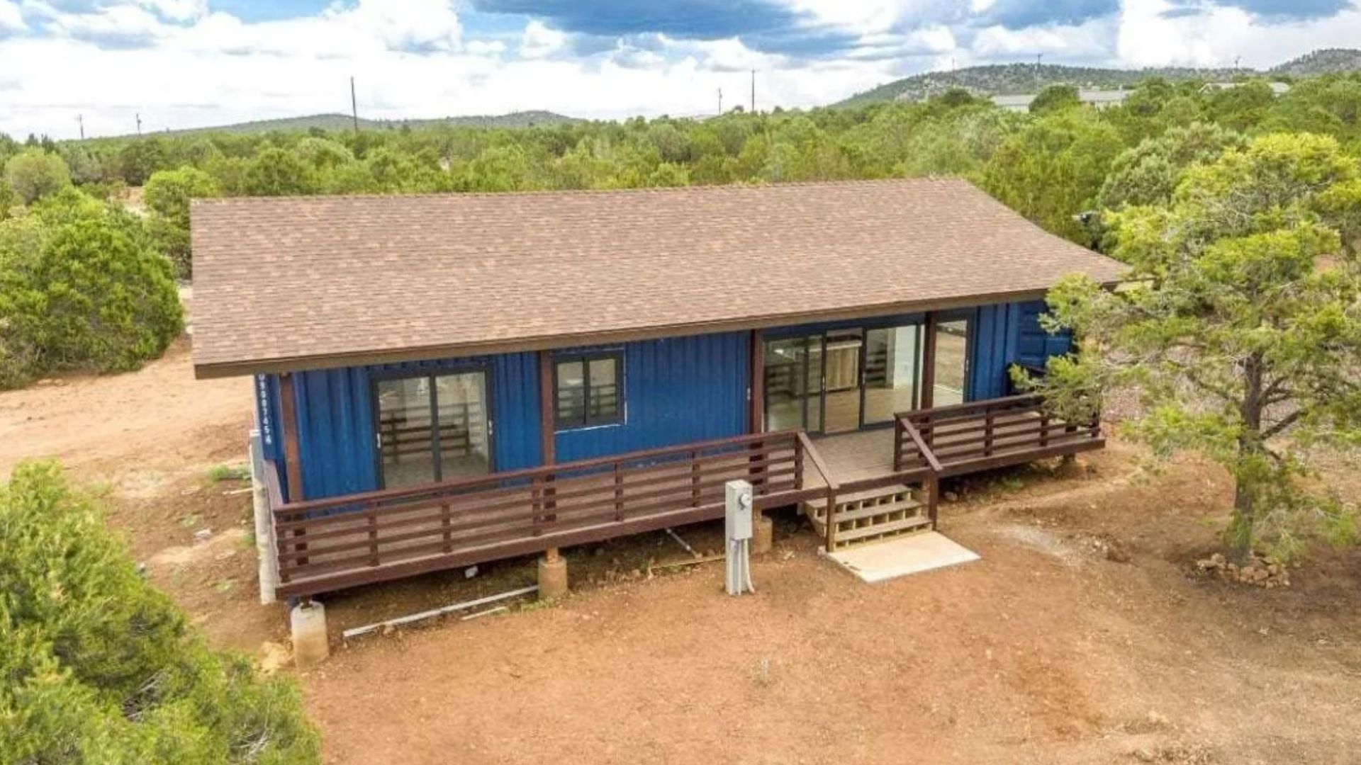 exterior of a blue container home