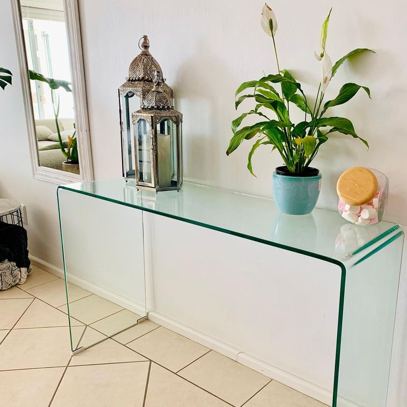 Use Glass or Lucite Furniture