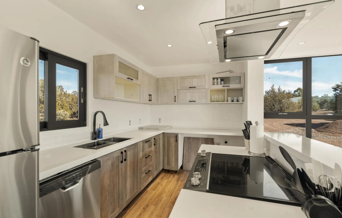 kitchen with white countertops, grayish brown cabinets, island