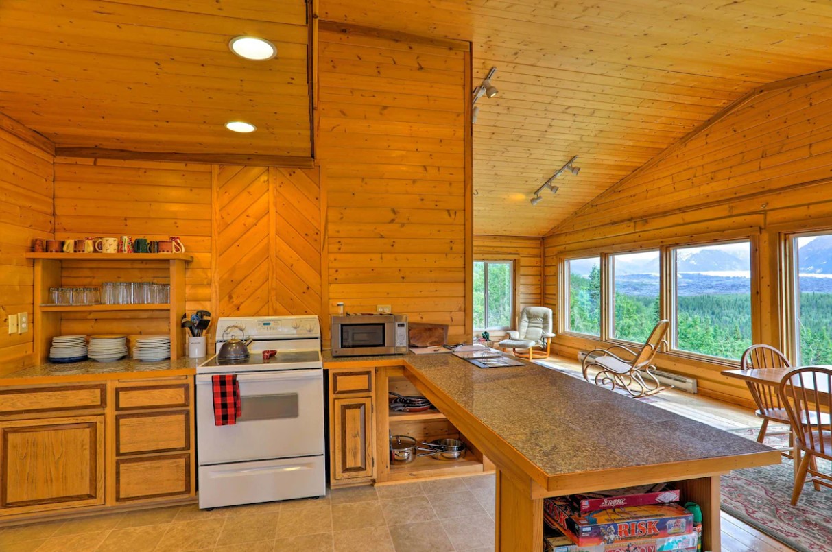 kitchen with brown walls, brown cabinets and open shelves