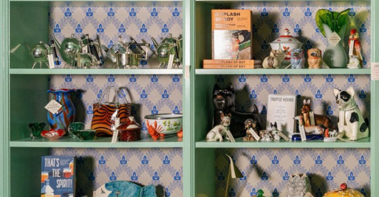 eclectic shelf with a wallpaper background