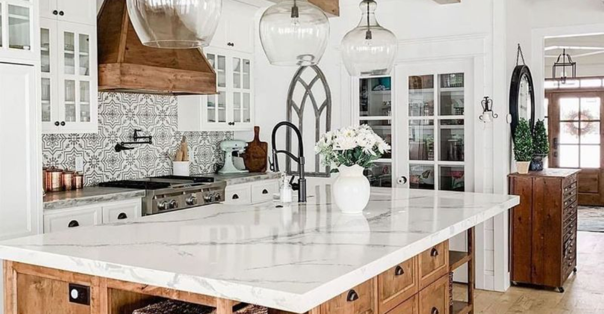 kitchen with marble countertops and white glass cabinets