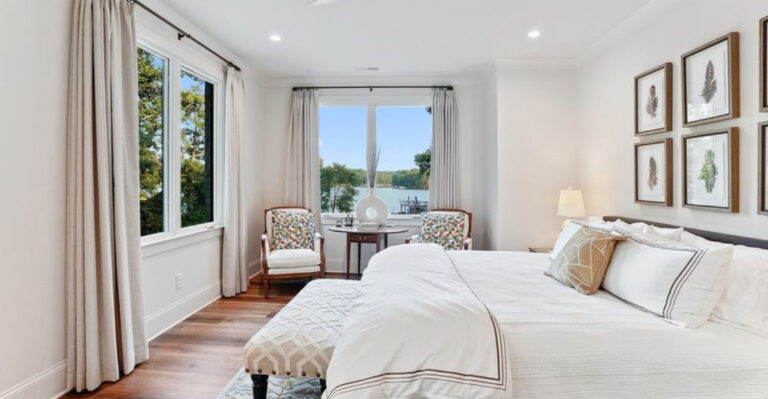 bedroom with big windows and white walls