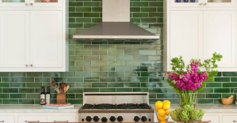 kitchen with a deep green backsplash