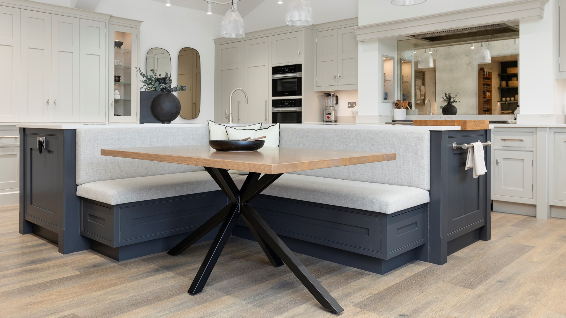 built in banquettes with hidden storage in the kitchen