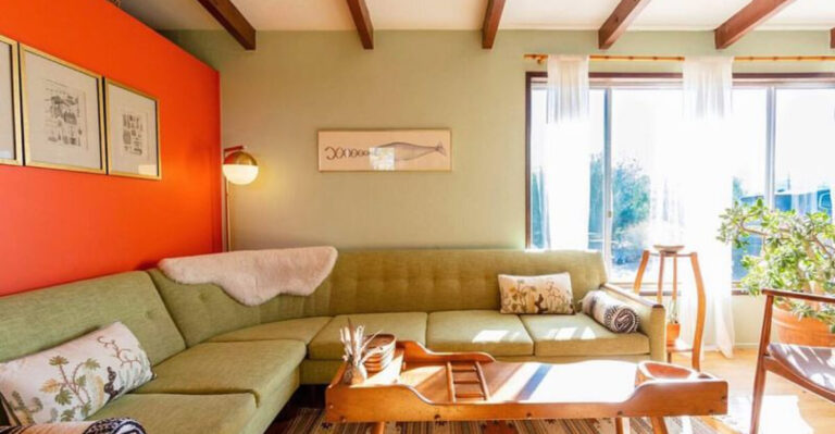 vintage mid-century living room with one orange wall