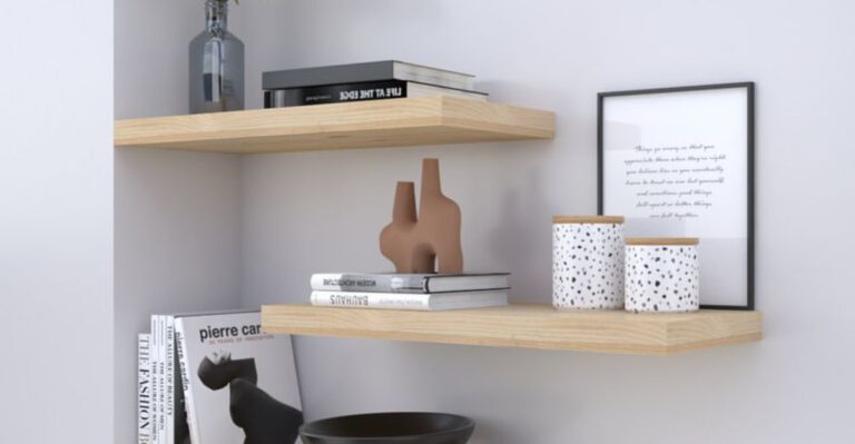 floating shelves with books and other decor