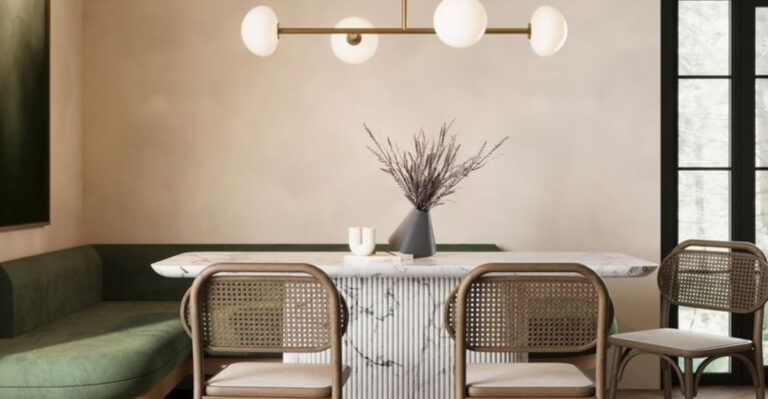 dining room with a statement lighting above
