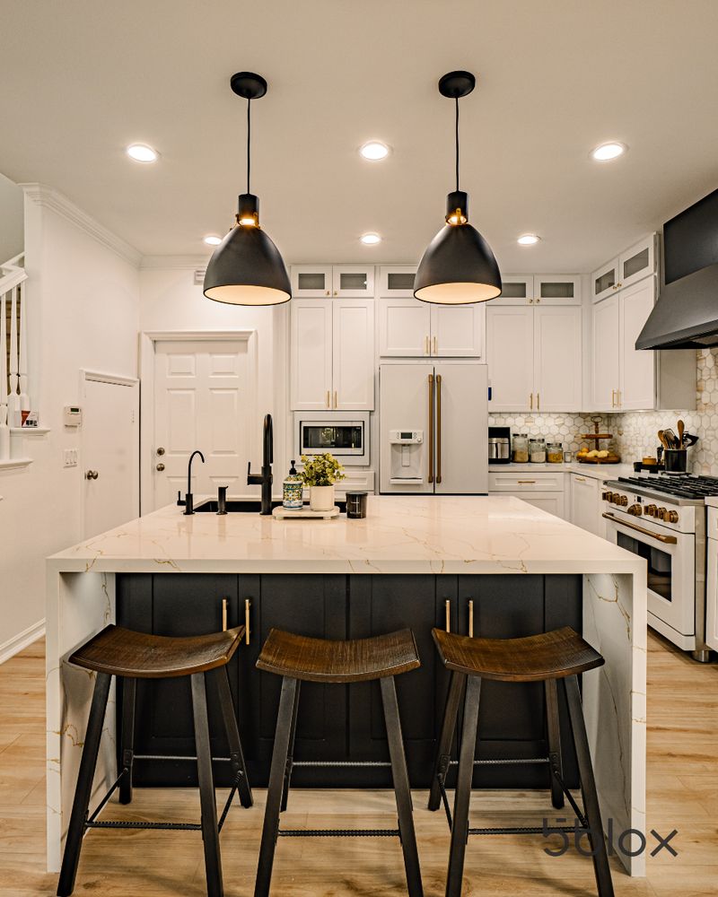 Black Pendant Lighting Over White Space