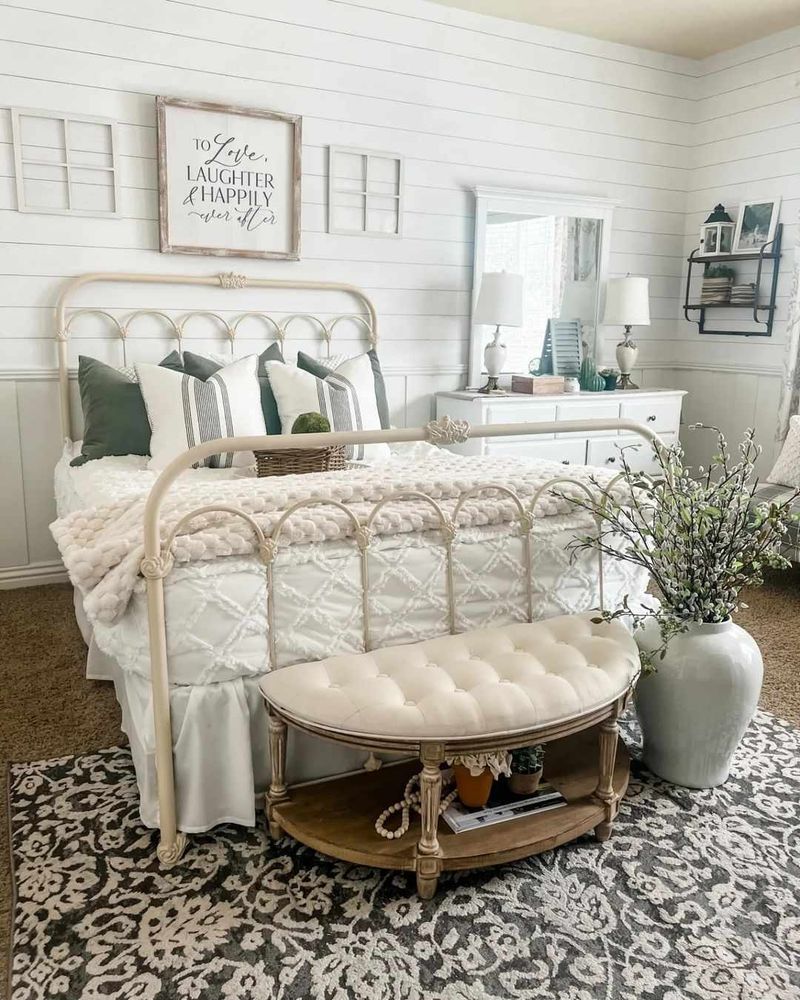 White Shiplap Walls with a Large Wood-Framed Bed