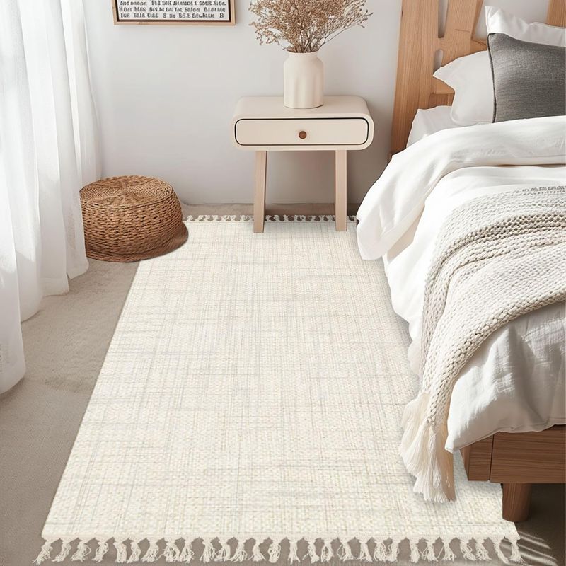 Neutral-Toned Woven Rugs Complementing White Walls