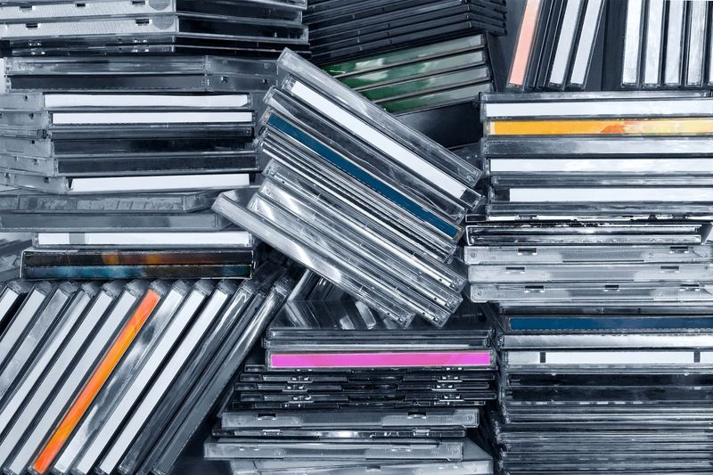 Stacks of CDs from Bands You Pretend to Forget