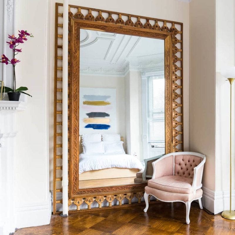 Hang Mirrors To Create The Illusion Of Height