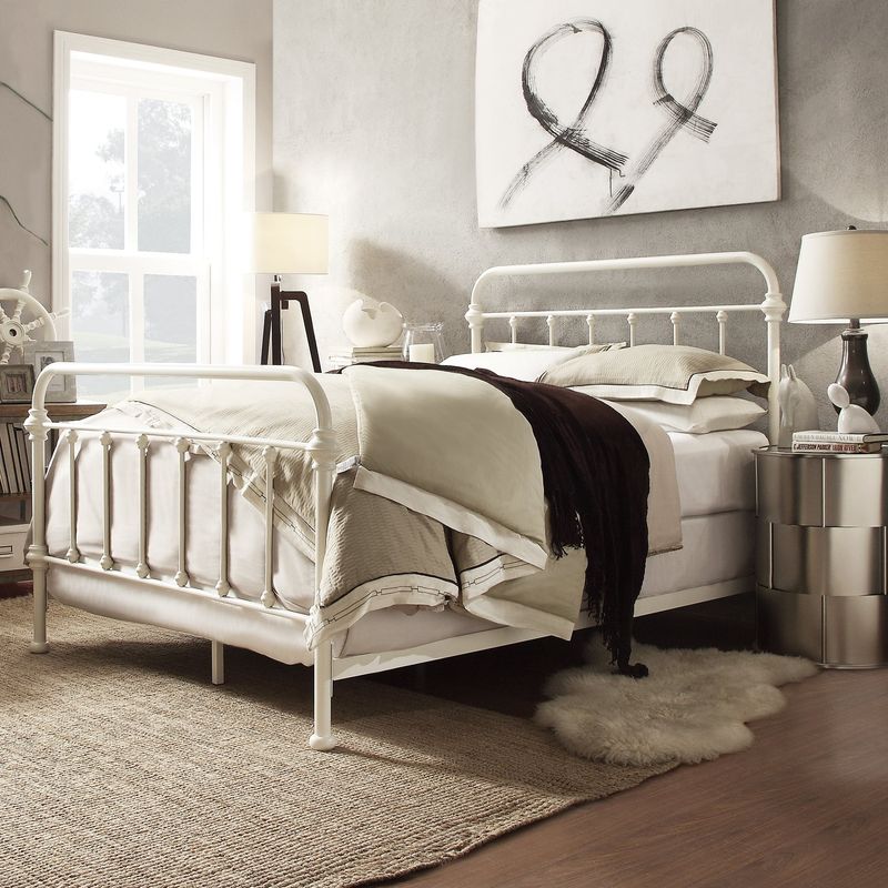 A Cozy White Iron Bedframe with Vintage Nightstands