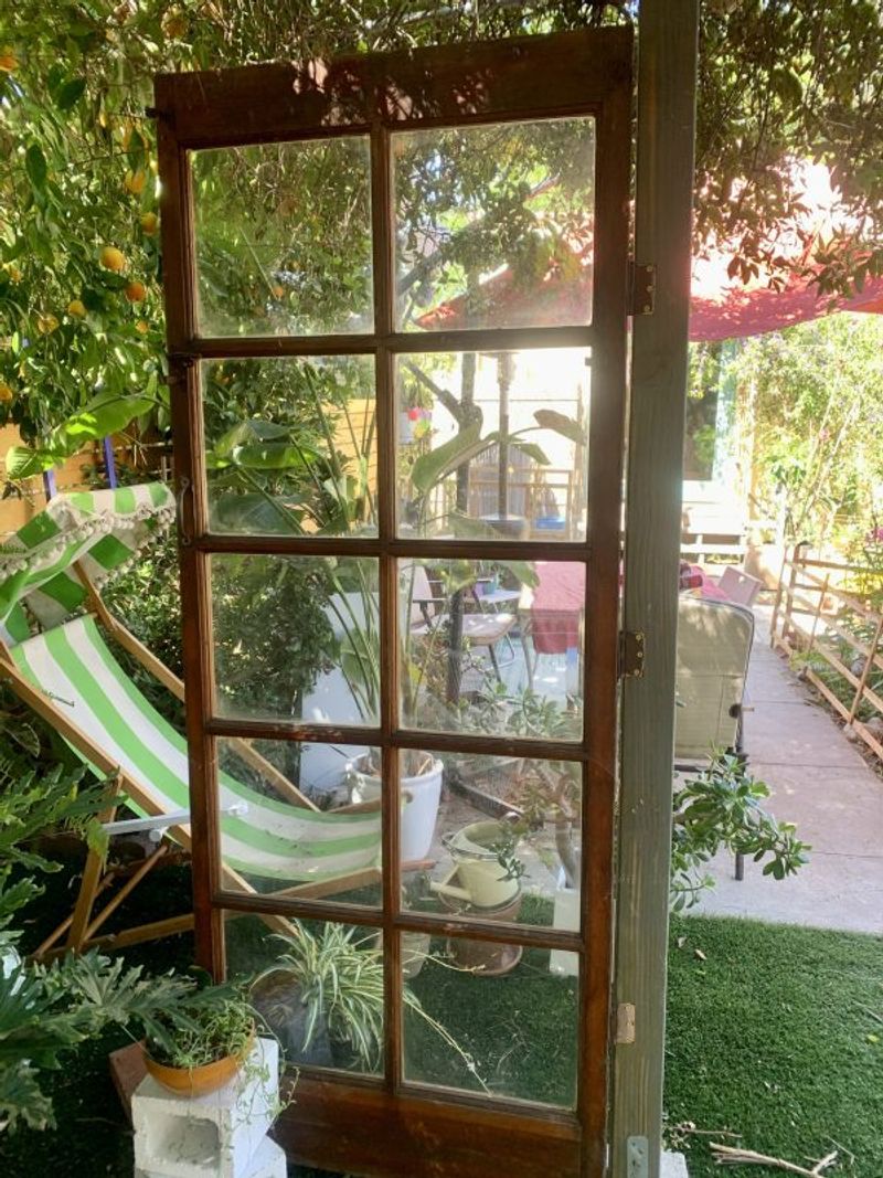 Sliding Glass Doors Leading To A Patio With No Furniture