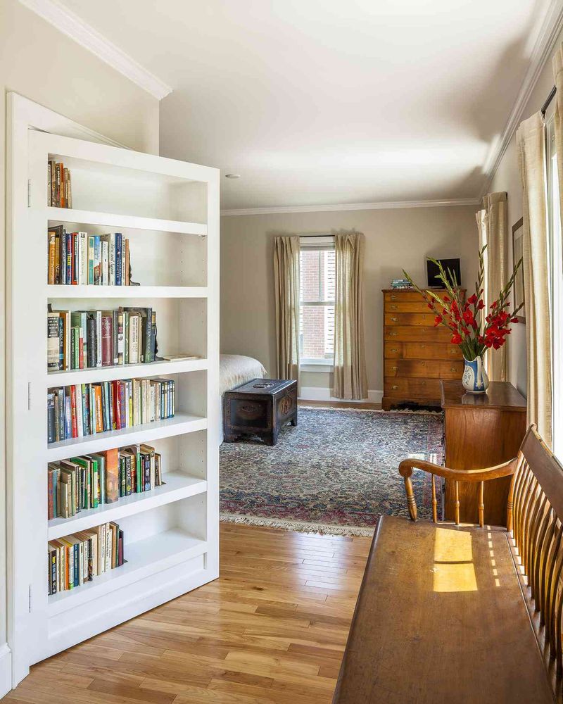 Hidden Storage Spaces Behind Bookshelves