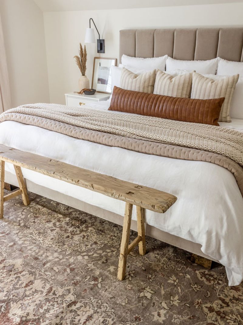 Rustic Charm with a Wooden Headboard and Neutral Linens