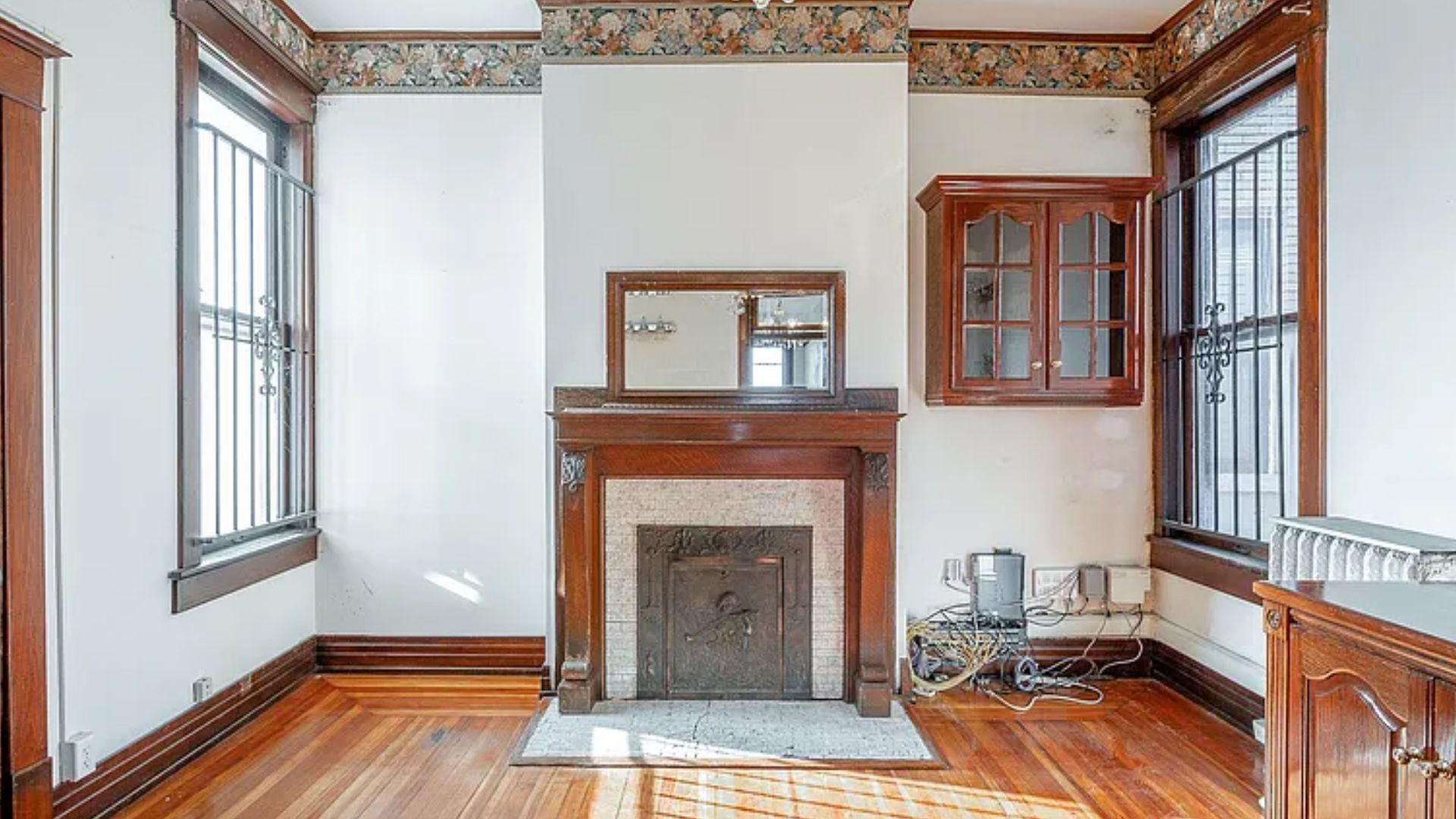 kitchen with a fireplace in a victorican home