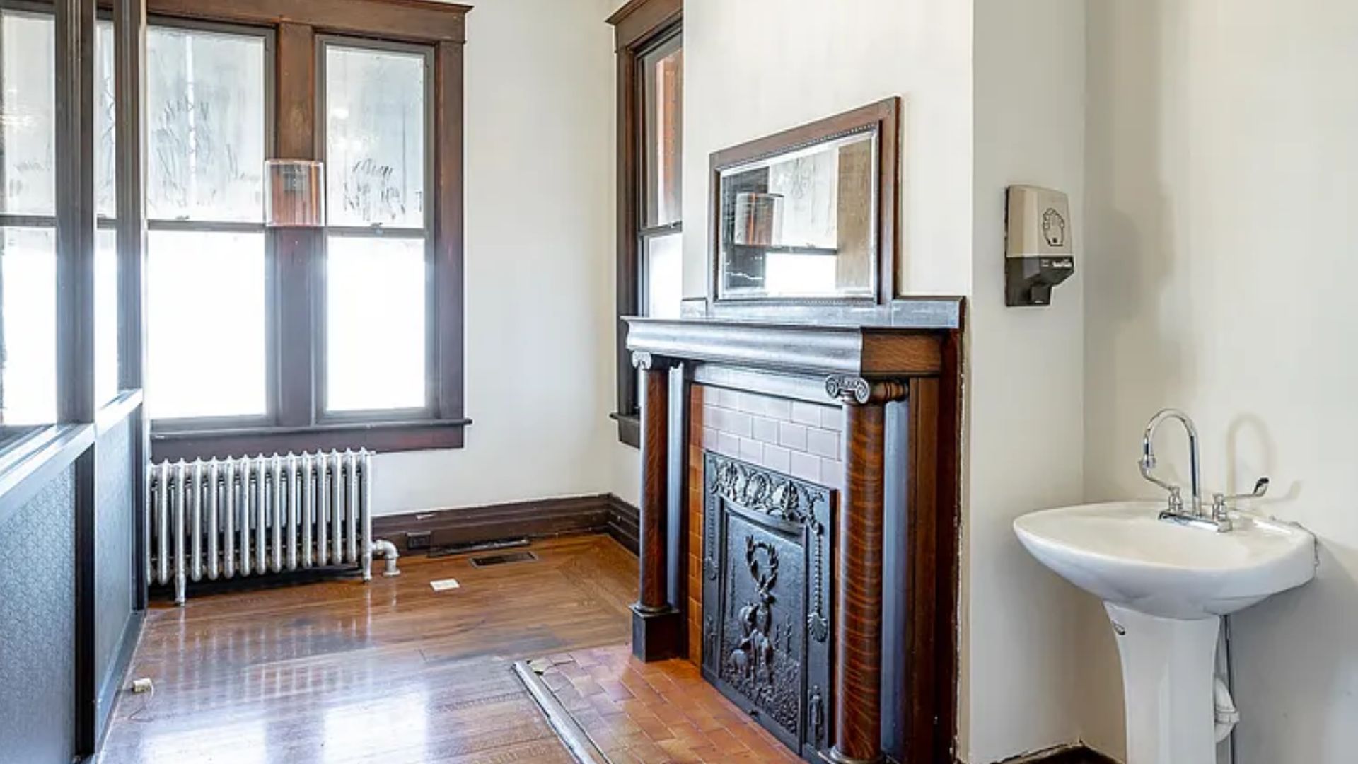 ensuite bathroom with a fireplace