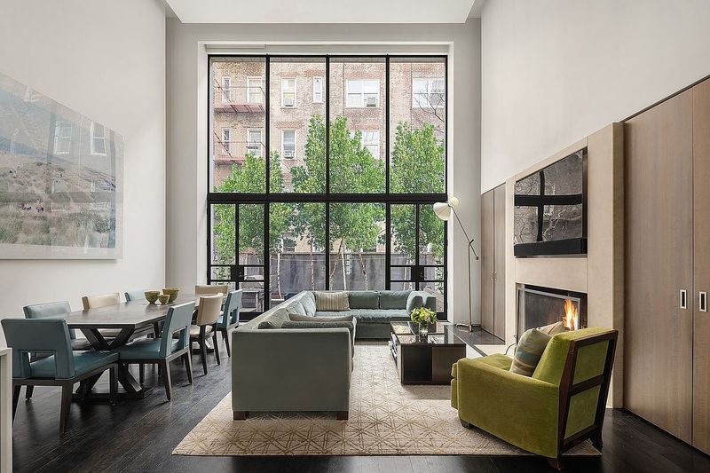 Loft-Like Living Room With Soaring Glass Wall