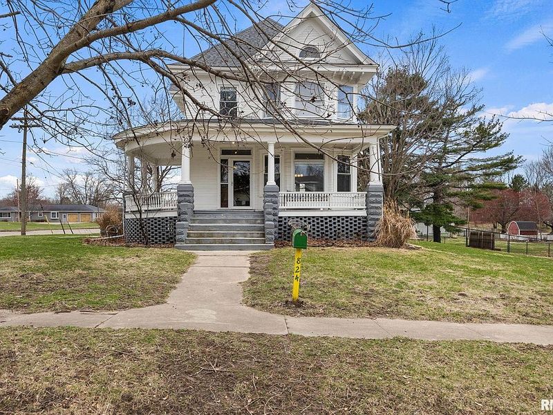Welcoming Wraparound Porch and Historic Presence