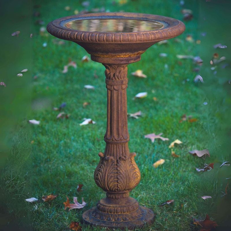 Ornamental Bird Baths Attract Feathered Visitors