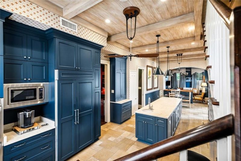 Statement Kitchen With Rich Color And Rustic Texture
