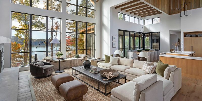 Airy Living Room with a Lake View Backdrop