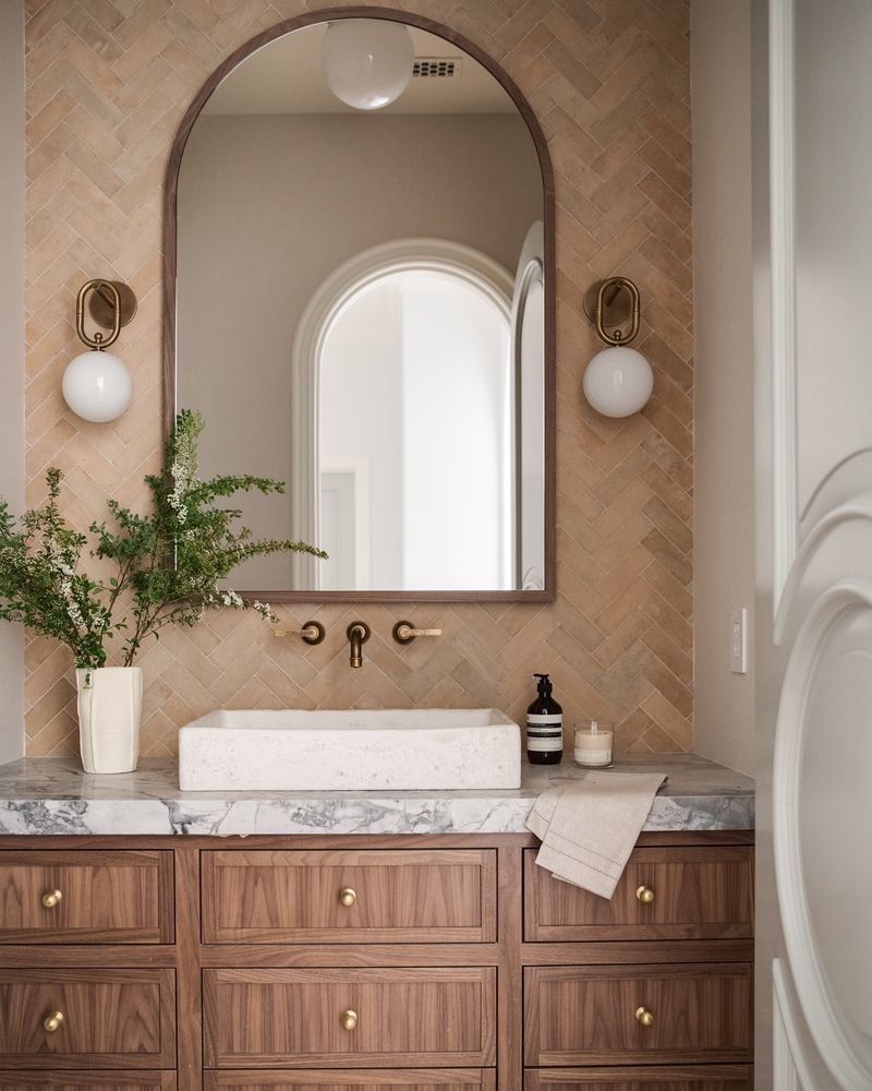 Quartzite Vanity Under Iron Pendants