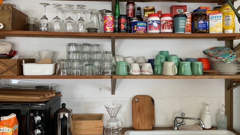 Open Shelving Filled With Mismatched Items