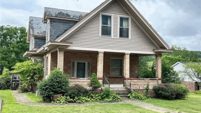 4 Historic Charleston WV Homes Under $300K With Grand Staircases, Crystal Chandeliers And Wraparound Porches